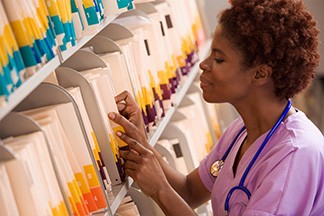 staff member getting patient forms